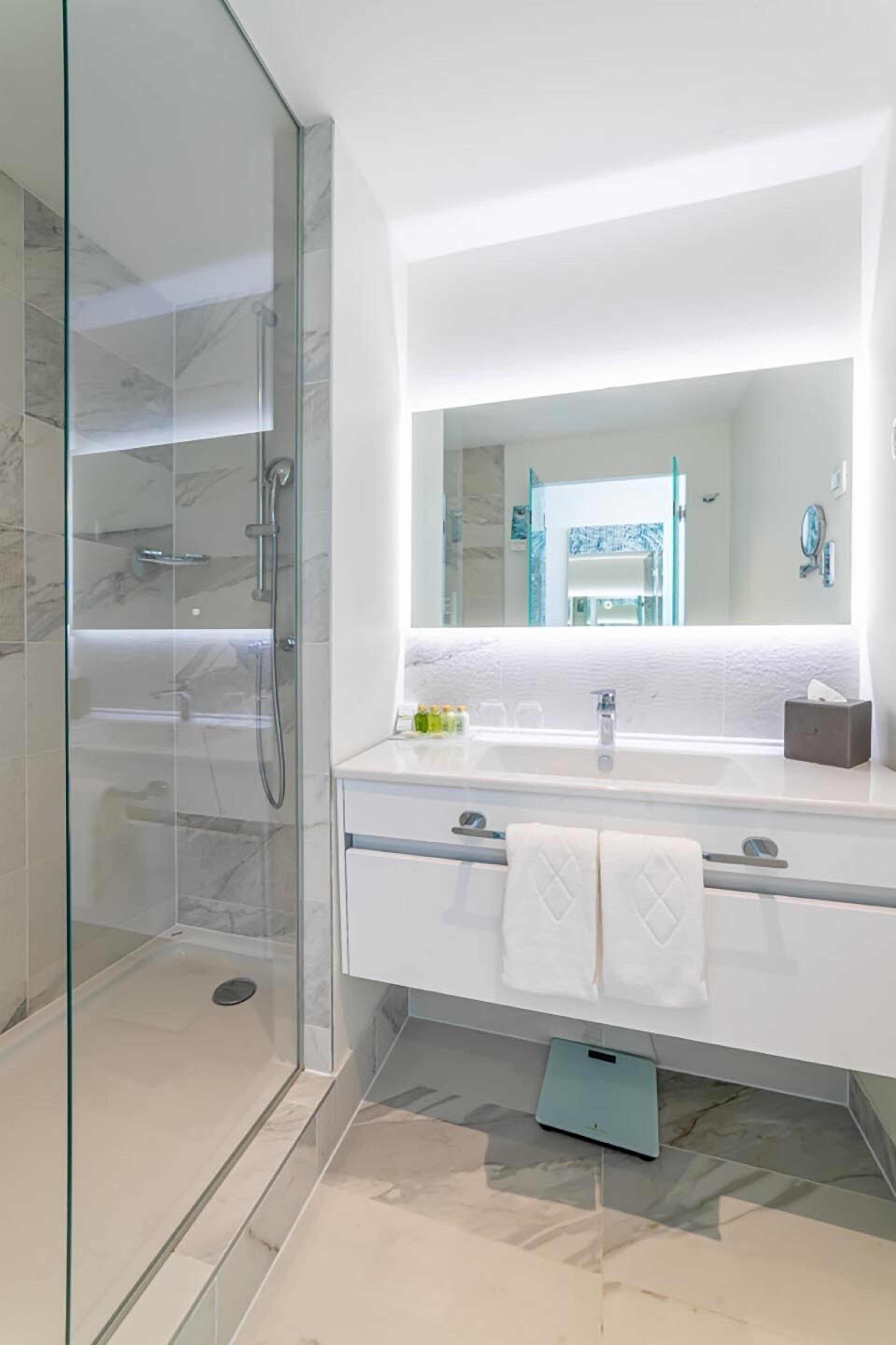 shower, free toiletries, hair dryer, bathrobes