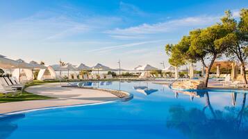 3 outdoor pools, cabanas (surcharge), pool umbrellas