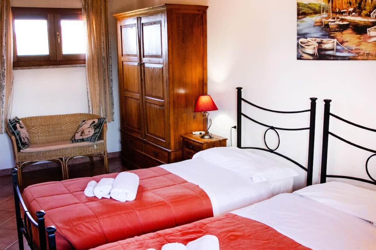Quadruple Room, Private Bathroom (External) | 1 bedroom, individually decorated, individually furnished, desk