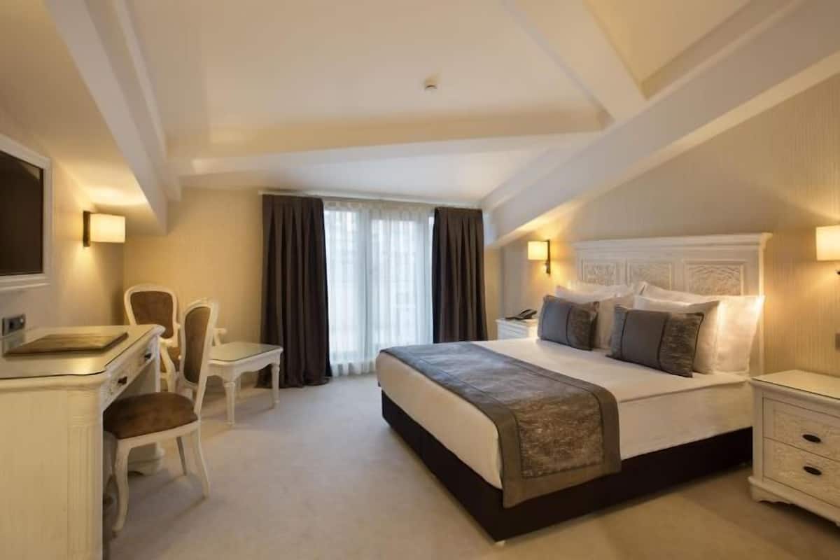 1 habitación, ropa de cama de alta calidad y minibar