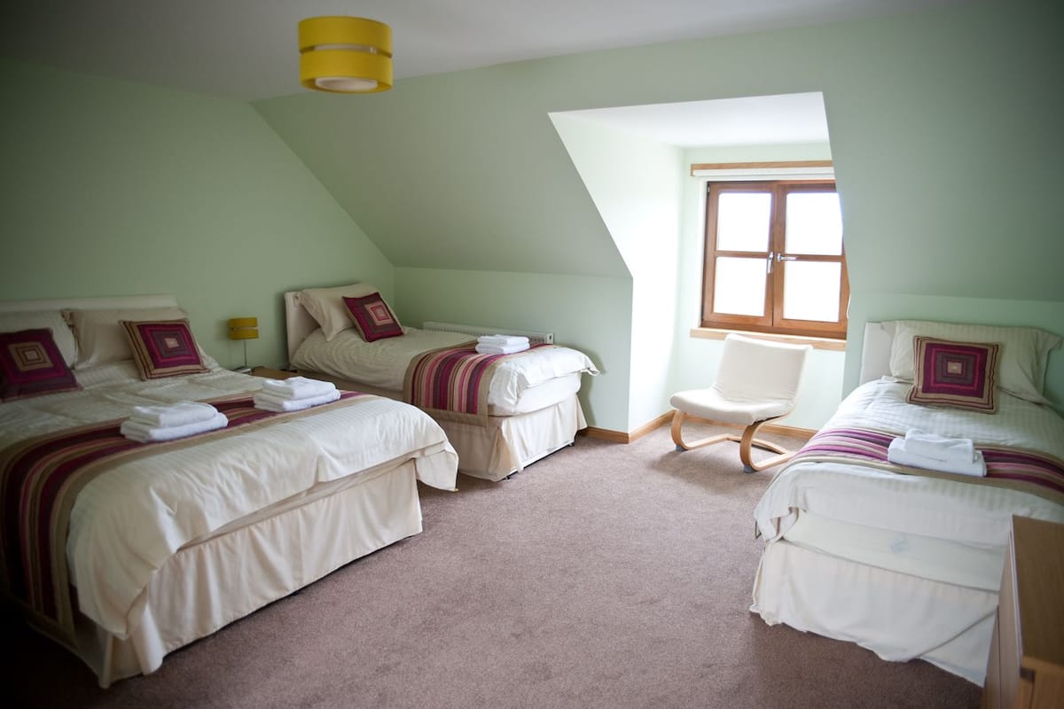 Quadruple Room (Room 5) | Memory-foam beds, individually decorated, individually furnished