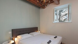 Apartamento, 2 habitaciones | 2 dormitorios, cunas (de pago), wifi gratis y ropa de cama