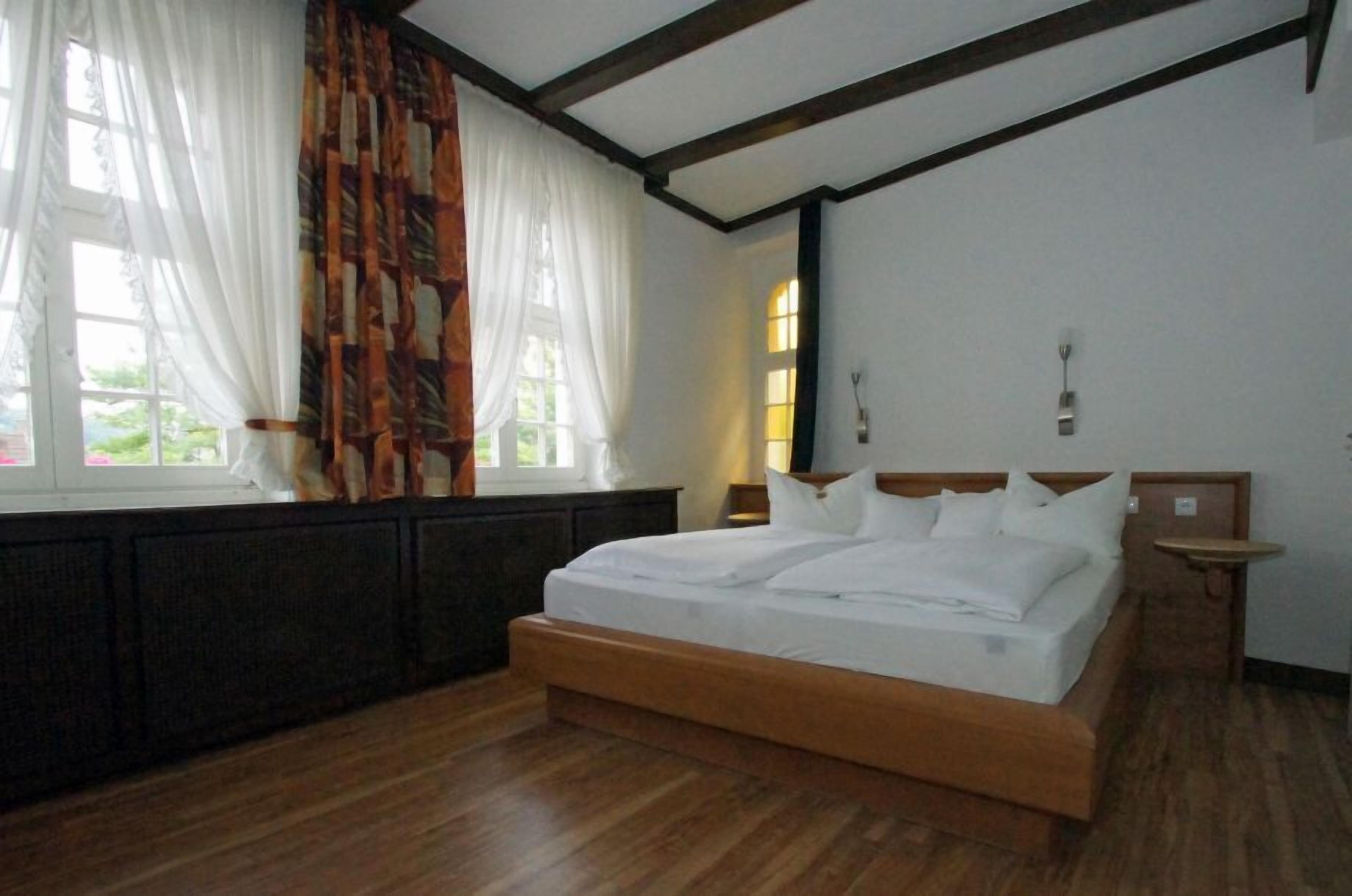 desk, blackout curtains, free wifi, bed sheets