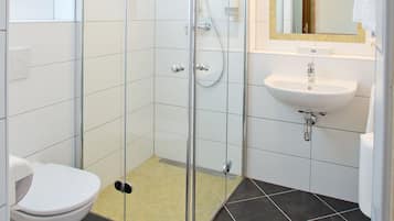 Shower, hair dryer, heated floors, towels