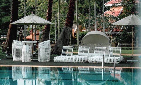 Outdoor pool, open 8:30 AM to 6:30 PM, pool loungers