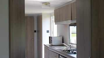 Classic Mobile Home, 3 Bedrooms | Private kitchen | Microwave, stovetop, coffee/tea maker, electric kettle