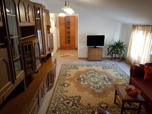 Swiss Apartment | Salle de séjour | Télévision LED