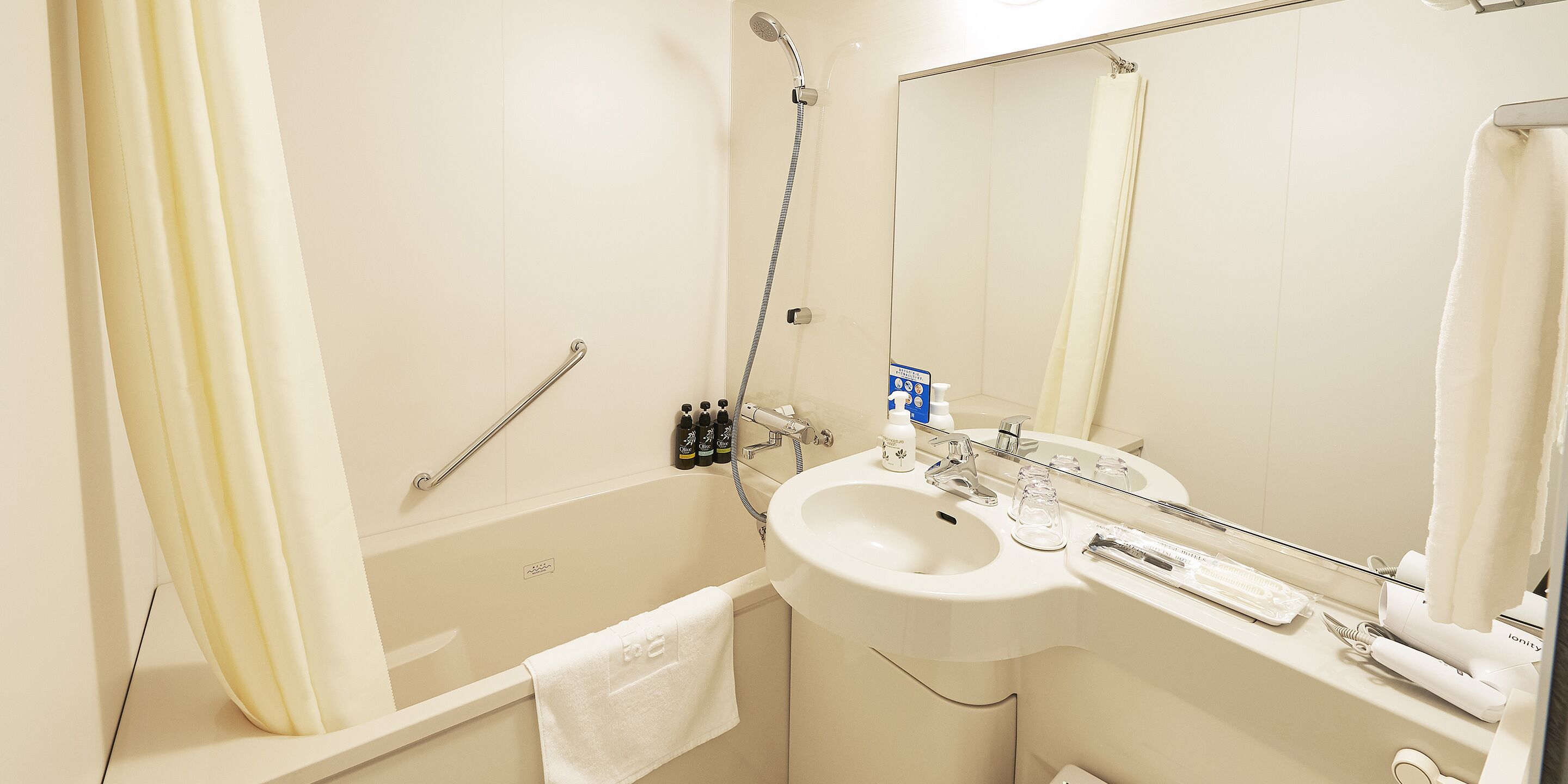 free toiletries, hair dryer, slippers, electronic bidet