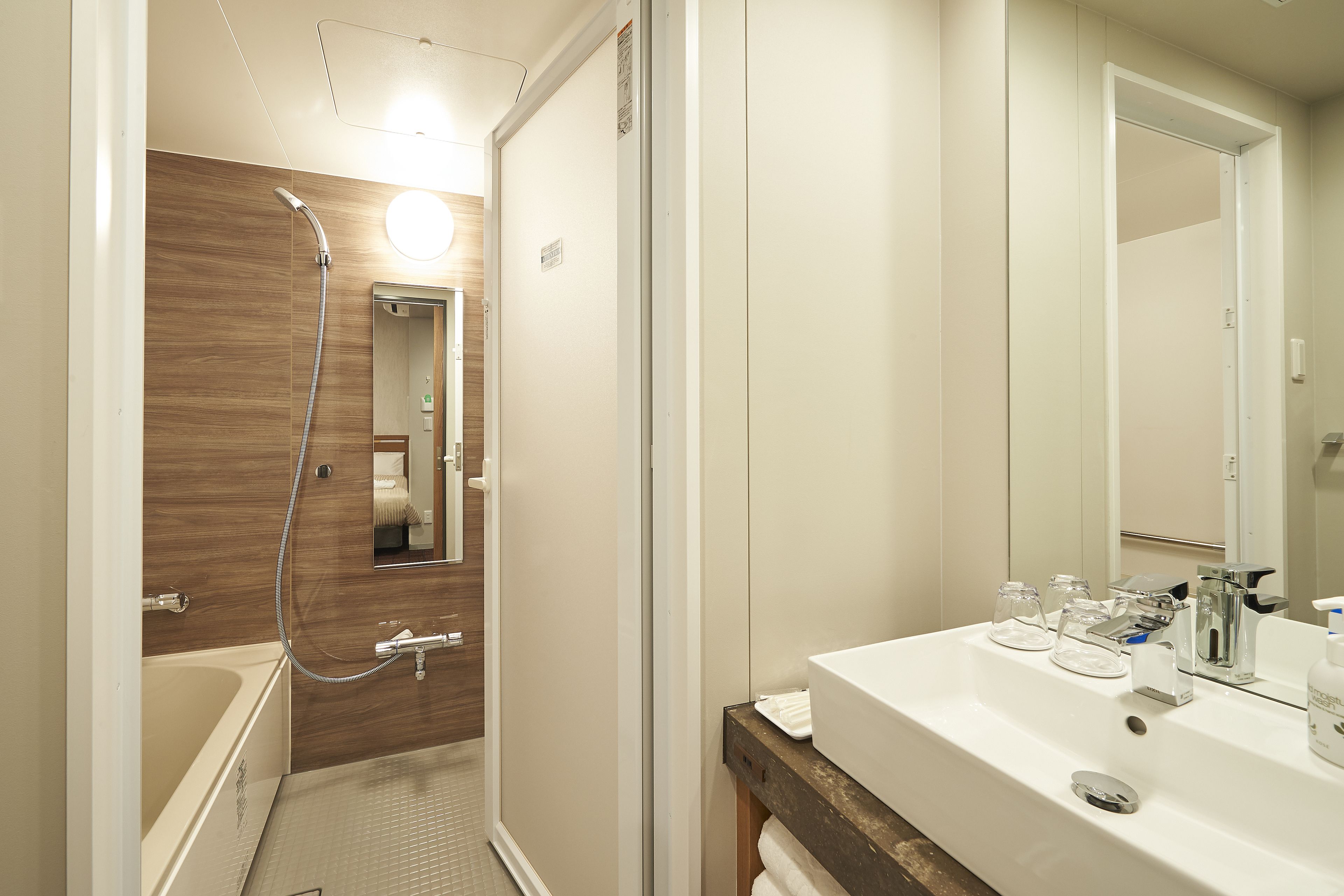 deluxe twin room, non smoking | bathroom | free toiletries, hair dryer, slippers, electronic bidet