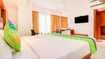 Hypo-allergenic bedding, in-room safe, laptop workspace