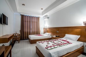 Chambre Deluxe avec lits jumeaux | Minibar, bureau, Wi-Fi gratuit
