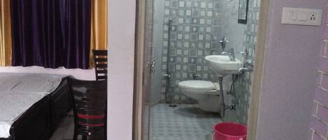 Shower, free toiletries, slippers, towels