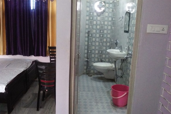 Shower, free toiletries, slippers, towels