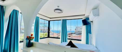 Deluxe Room, 1 Queen Bed, Non Smoking, Sea View | Minibar, in-room safe, soundproofing, iron/ironing board