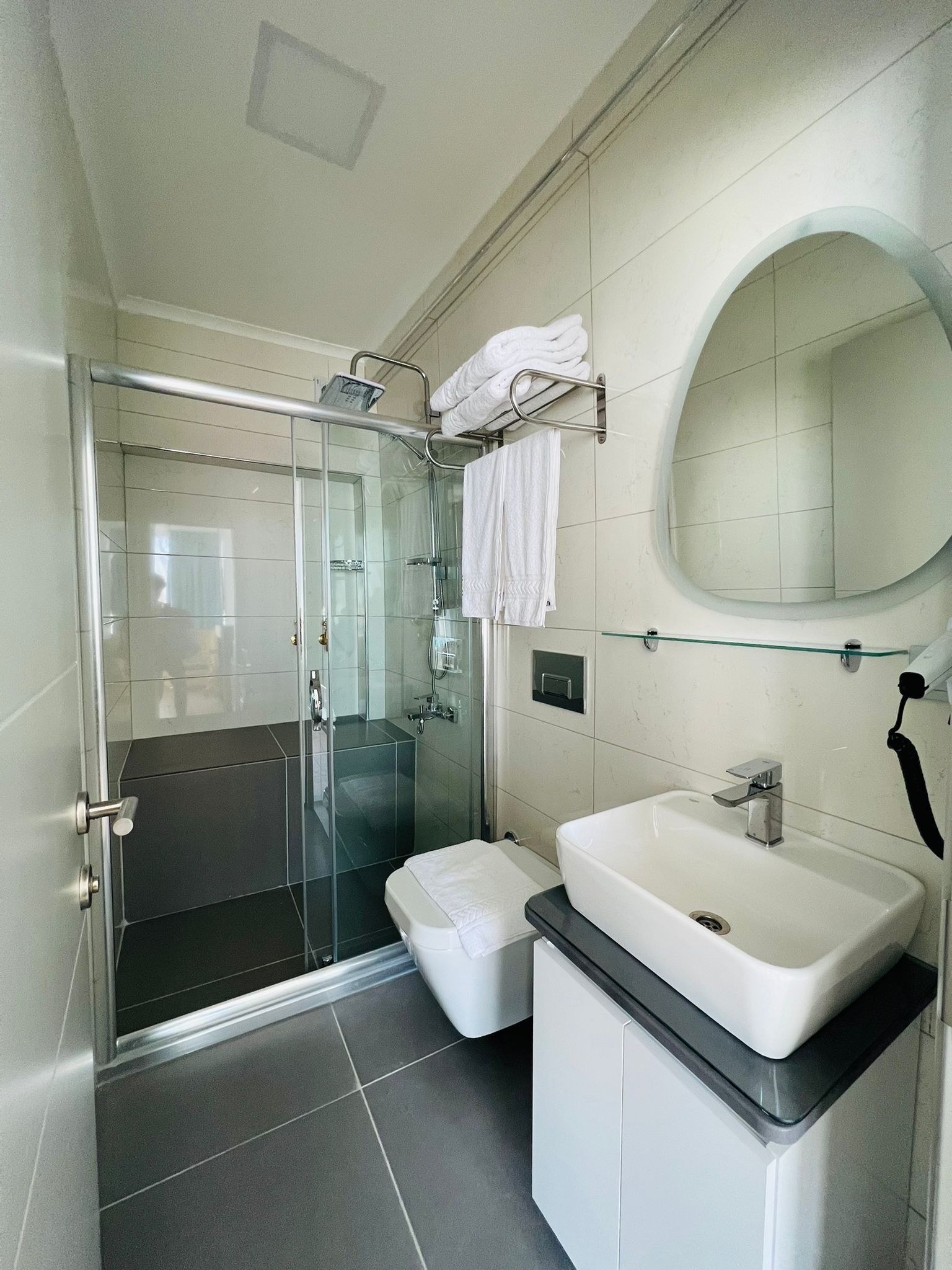 shower, free toiletries, hair dryer, slippers