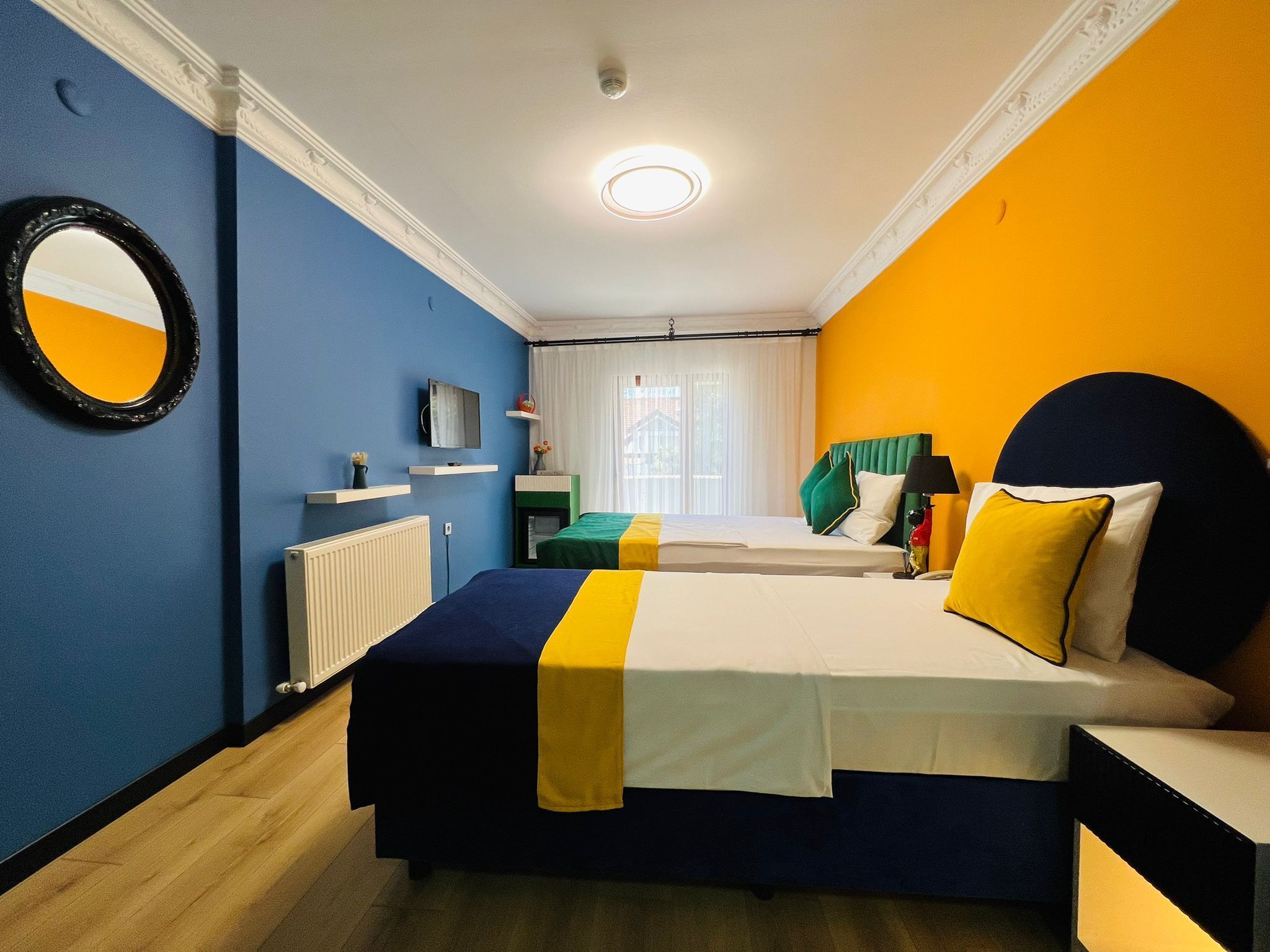 classic triple room, multiple beds, balcony | 1 bedroom, minibar, in-room safe, soundproofing