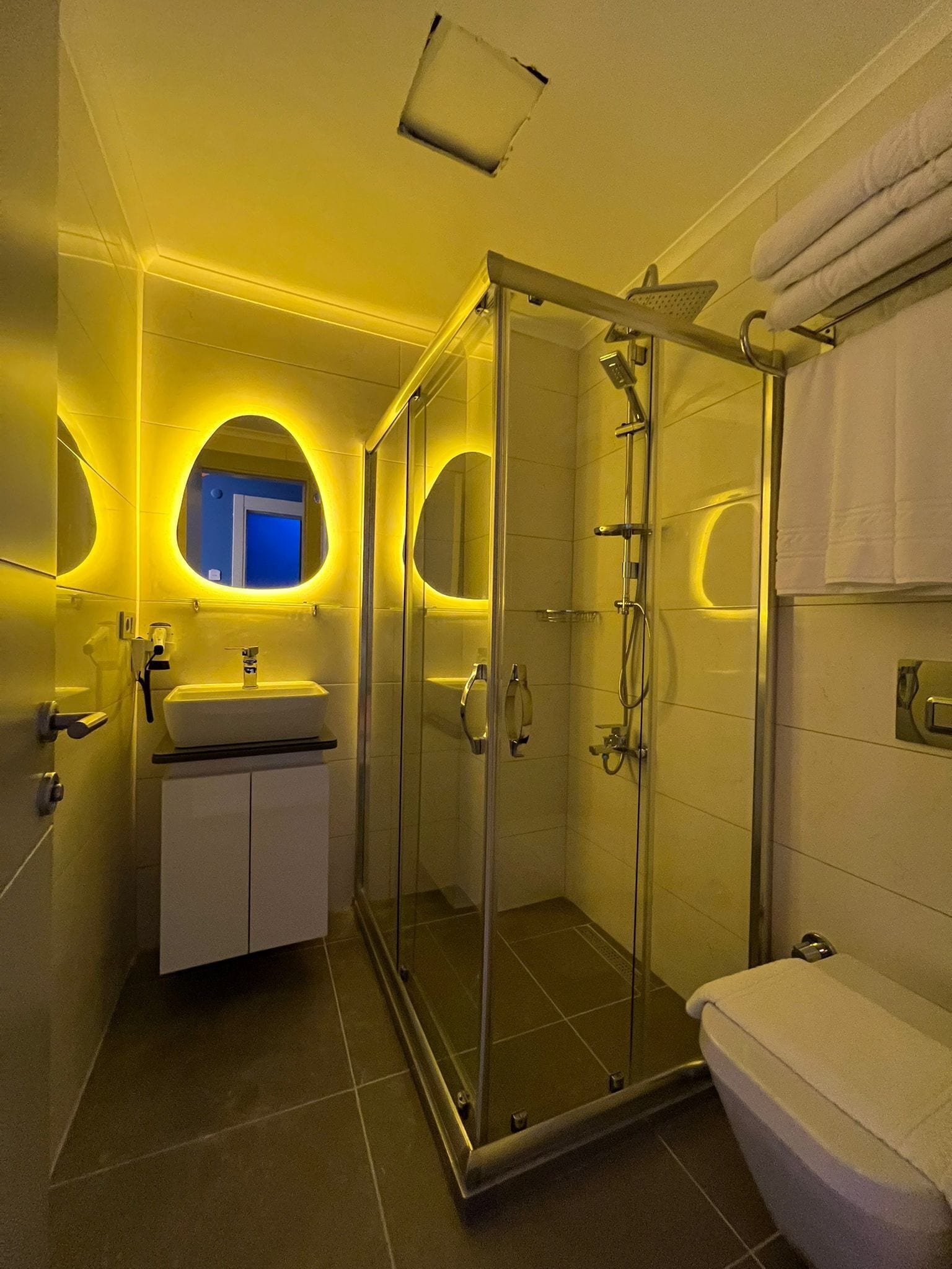 shower, free toiletries, hair dryer, slippers