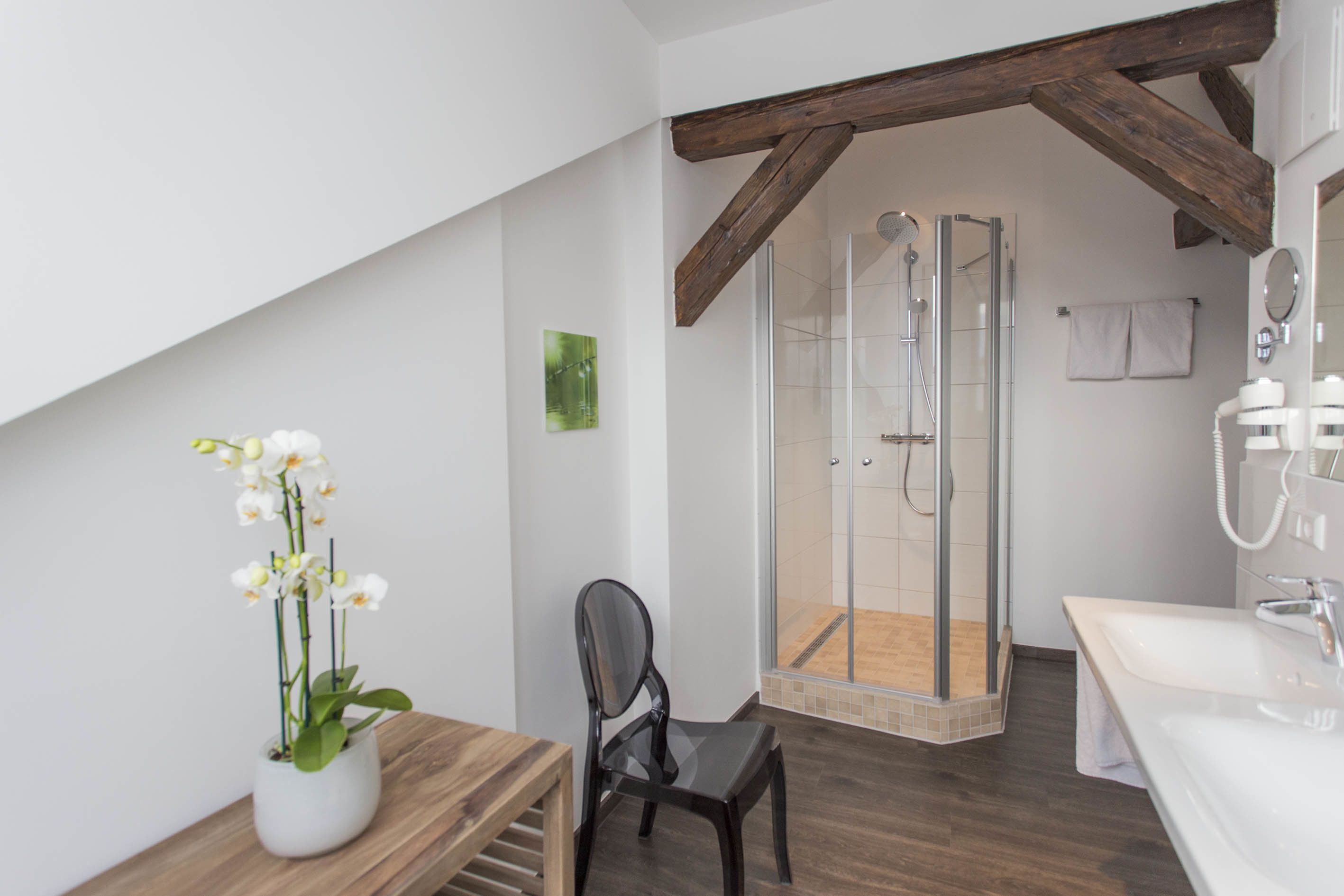 superior double room | bathroom | shower, free toiletries, hair dryer, towels