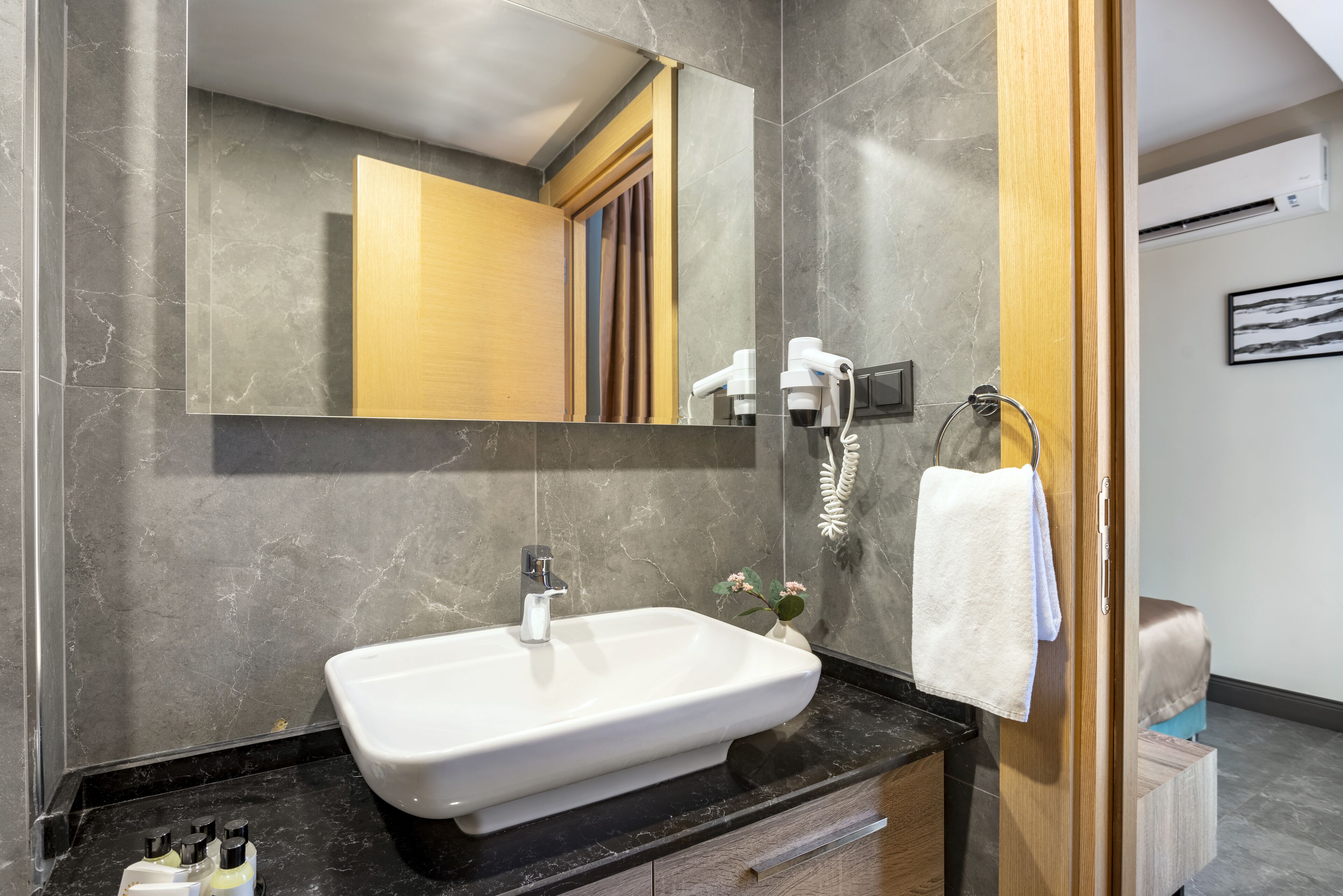 shower, free toiletries, hair dryer, slippers