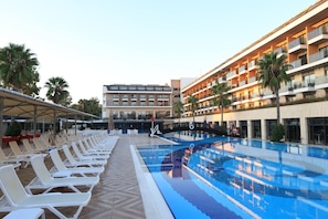 Indoor pool, outdoor pool, pool umbrellas, sun loungers