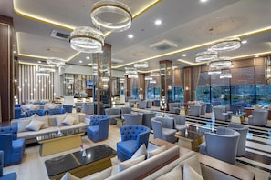 5 bars/lounges, poolside bar, beach bar