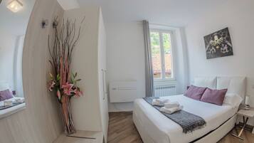 Family Apartment, 2 Bedrooms | 2 bedrooms, iron/ironing board, cribs/infant beds, rollaway beds