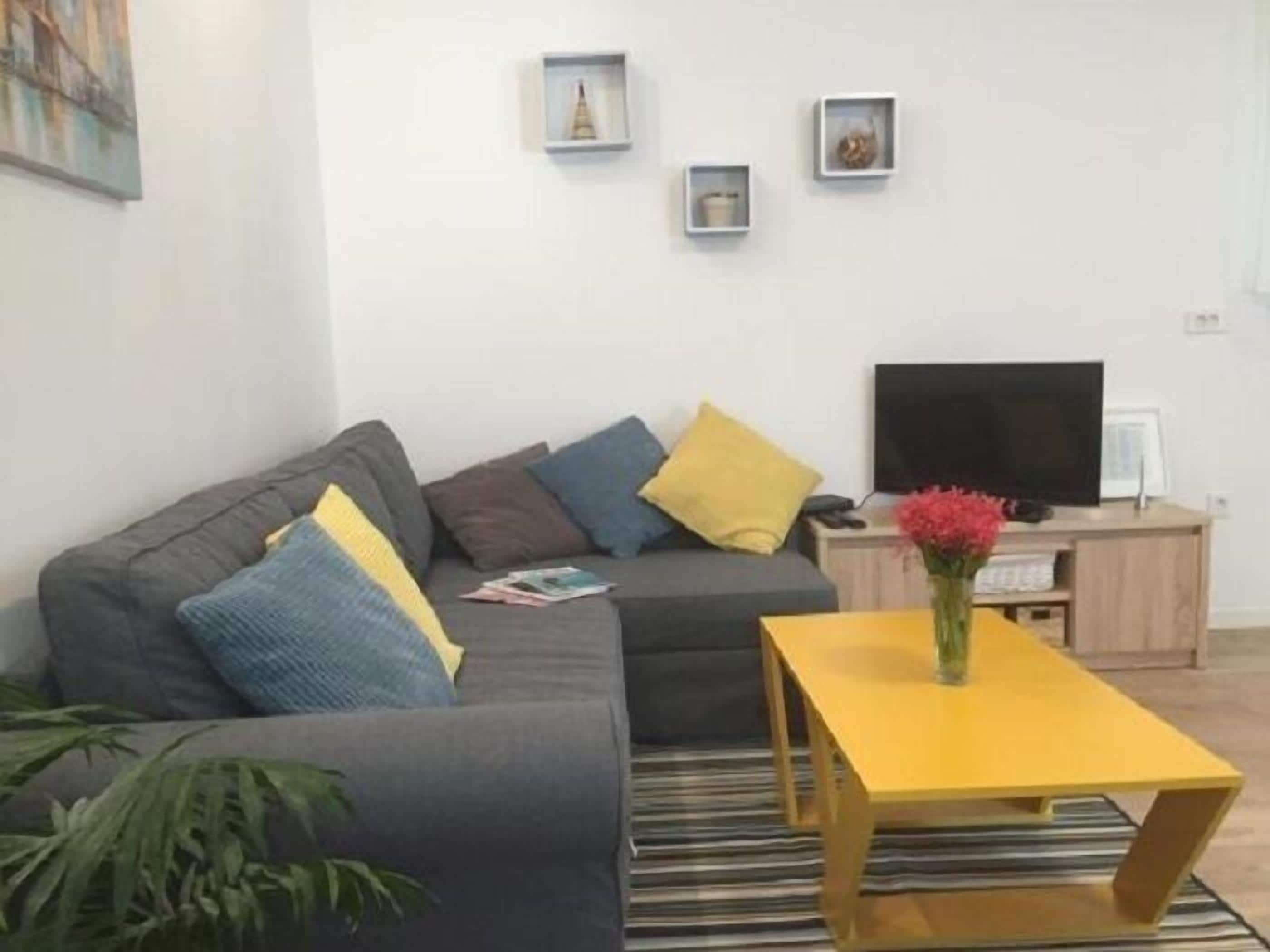 Appartement Ville | Salle de séjour | Télévision à écran plat