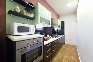 Apartment, 1 Queen Bed with Sofa bed | Private kitchen | Full-size fridge, microwave, oven, stovetop
