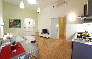 Apartment, 1 Bedroom | Living area | Flat-screen TV