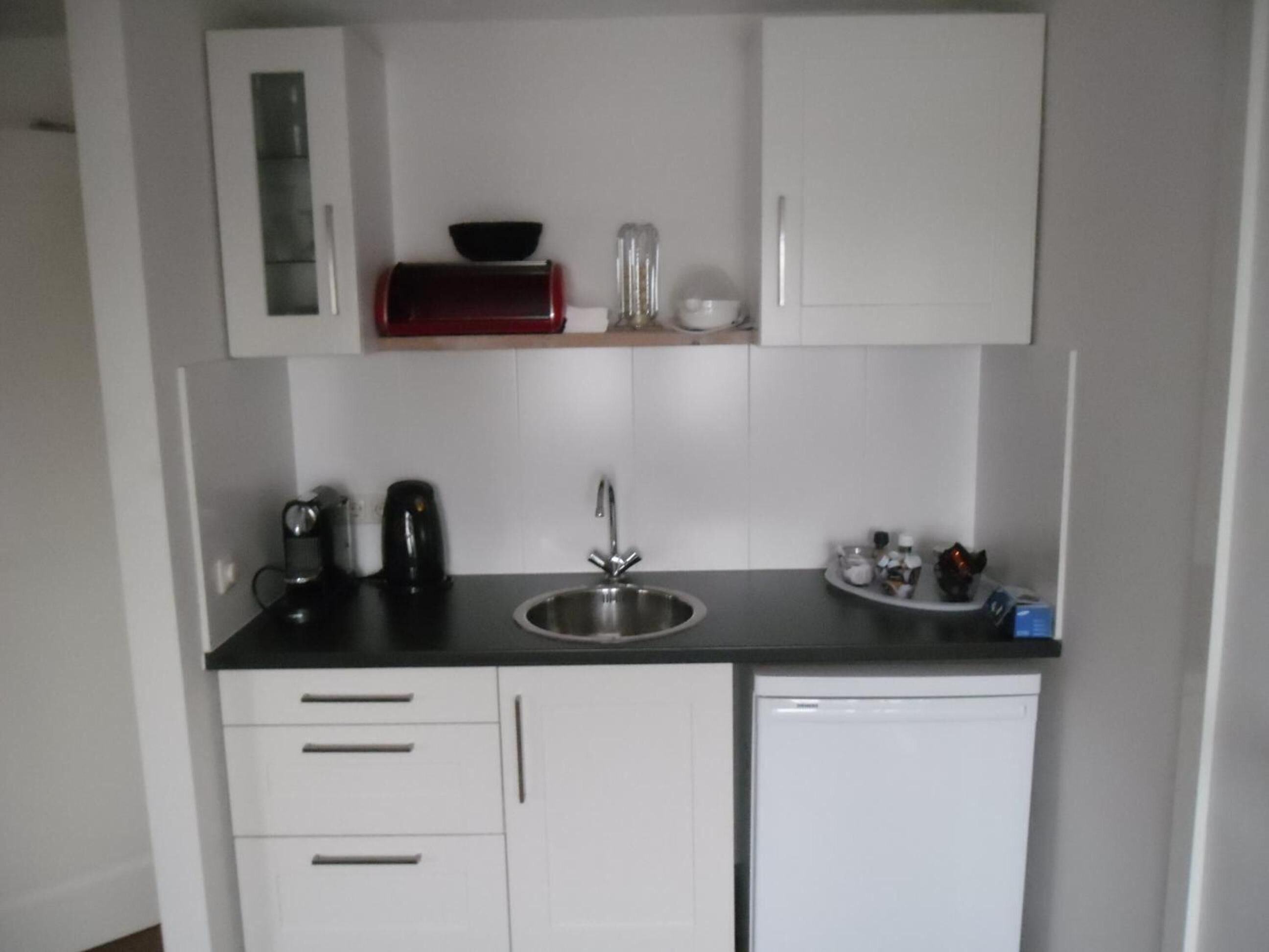 full-sized fridge, espresso maker, coffee/tea maker, electric kettle