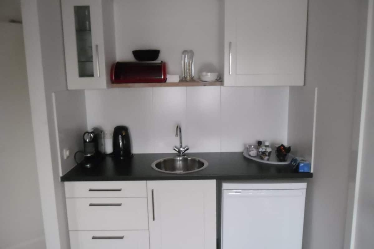 full-sized fridge, espresso maker, coffee/tea maker, electric kettle