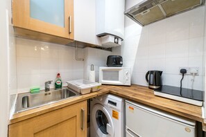 Estúdio elite, 1 cama de casal e sofá-cama, para não fumantes | Cozinha privada | Geladeira, micro-ondas, cooktop, cafeteira/chaleira