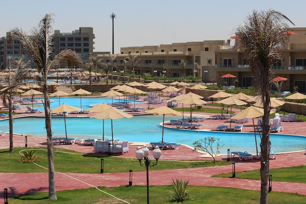 Seasonal outdoor pool, open 8:00 AM to 6:00 PM, cabanas (surcharge)