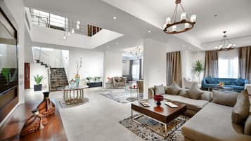 Royal Villa | Living area | 43-inch LED TV with cable channels, TV