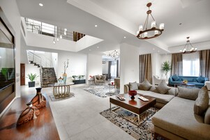 Royal Villa | Living area | 43-inch LED TV with cable channels, TV