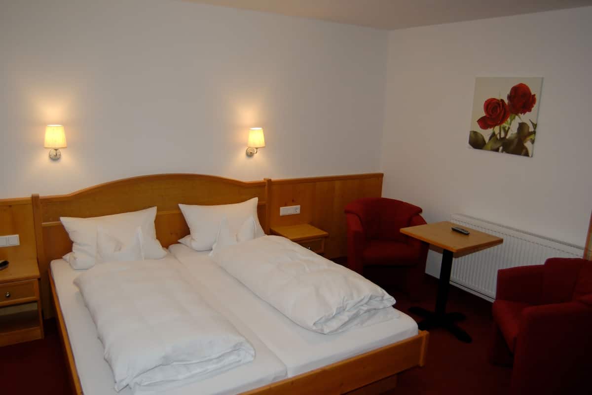 Desk, blackout curtains, free WiFi, bed sheets