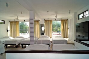Dormitorio compartido, camas individuales