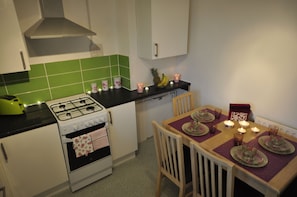 Basic Apartment, 3 Bedrooms | Private kitchen | Fridge, oven, stovetop, electric kettle