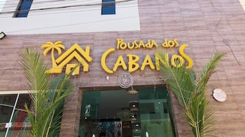 A building with a sign reading "Pousada dos Cabanos."