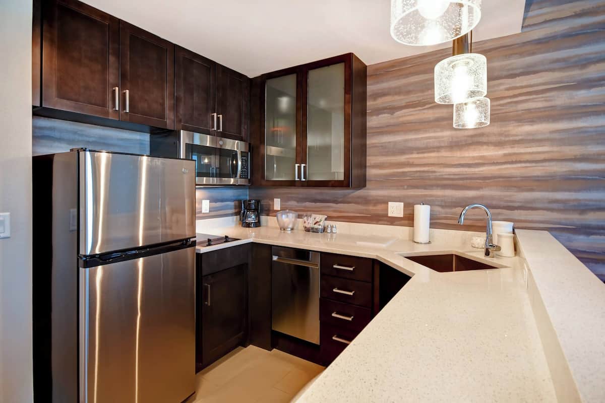 studio, 1 king bed with sofa bed | private kitchen | full-sized fridge, microwave, oven, stovetop