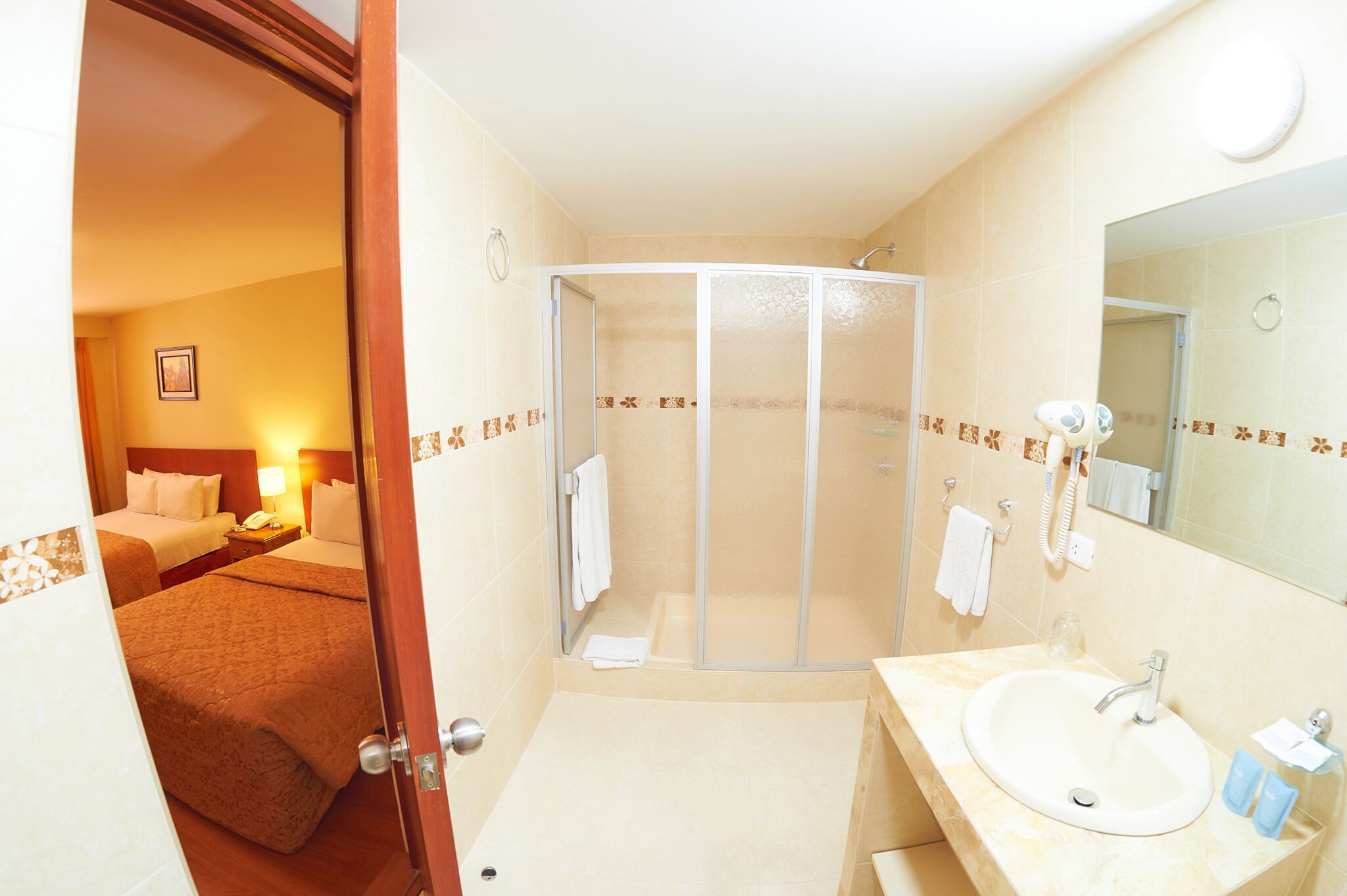 twin room | bathroom | shower, rainfall showerhead, free toiletries, hair dryer