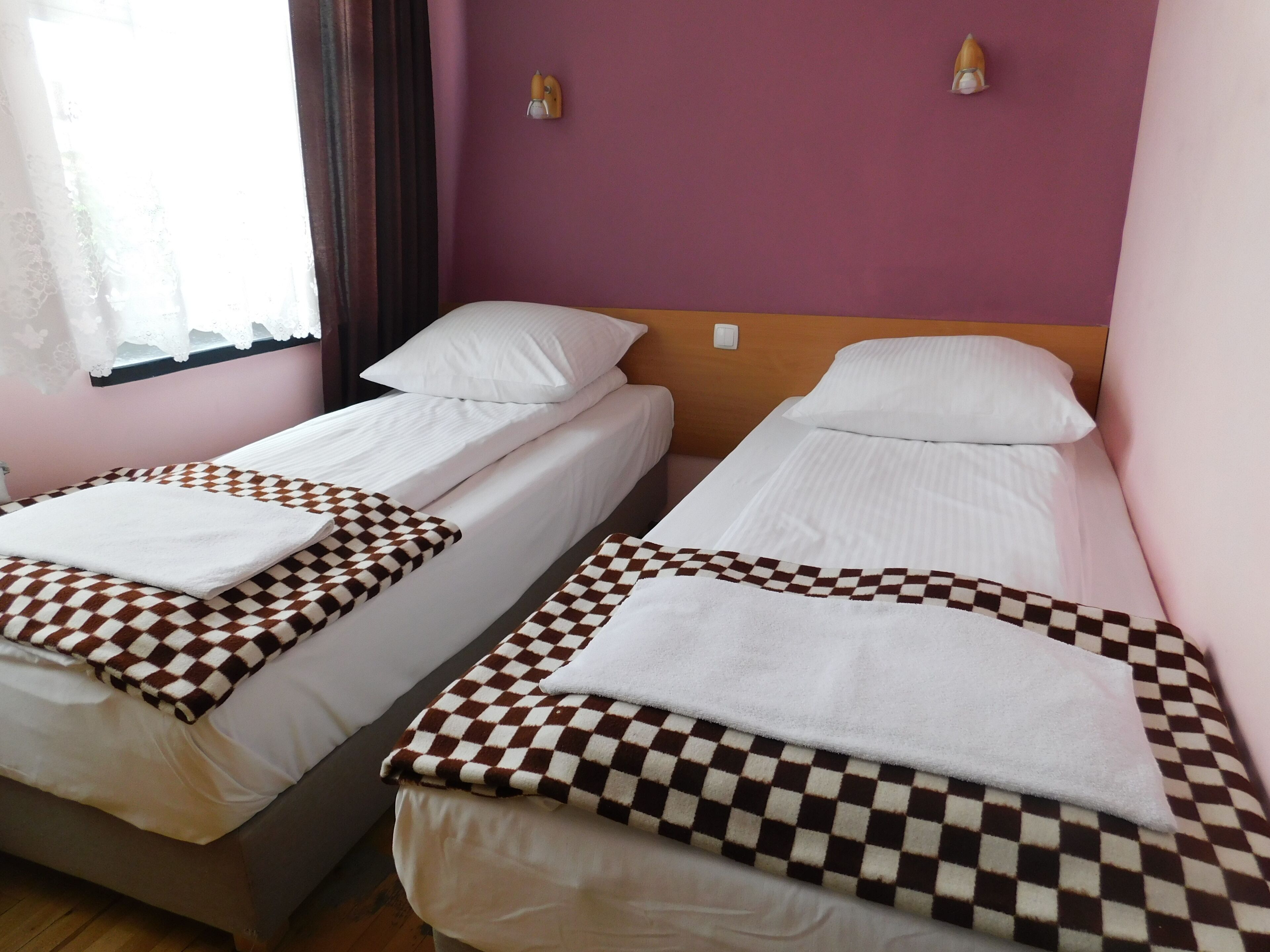 basic twin room | in-room safe, iron/ironing board, free wifi, bed sheets