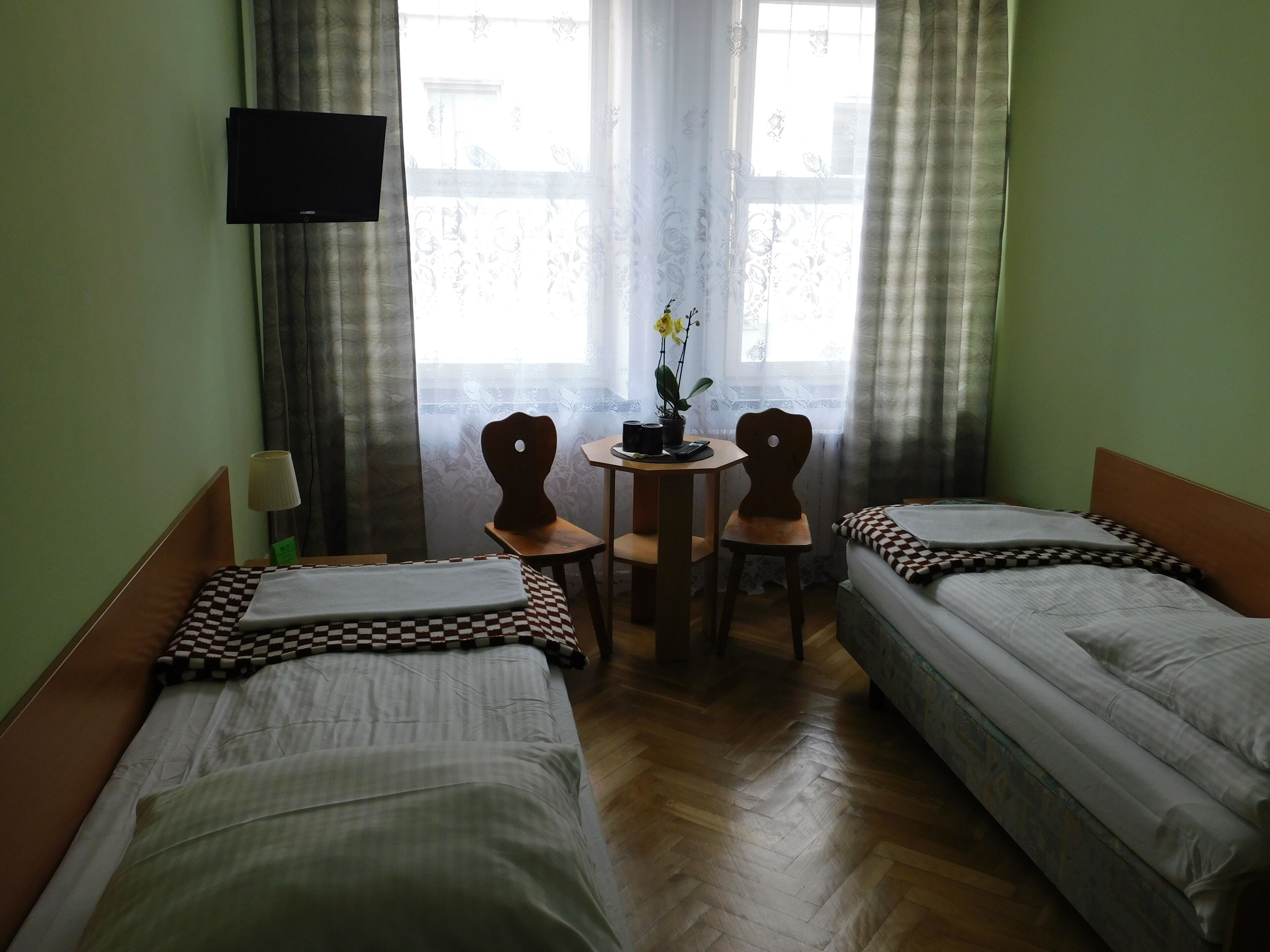 basic twin room | in-room safe, iron/ironing board, free wifi, bed sheets