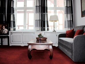 Comfort Apartment | Living area | Flat-screen TV - Apartments im Kaffeehaus Heldt (Eckernfoerde)