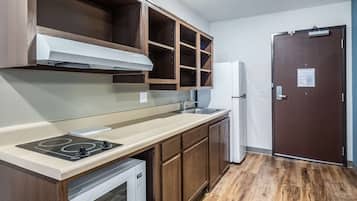 Full-sized fridge, microwave, stovetop, freezer