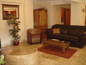 Flat-screen TV, DVD player, books, music library