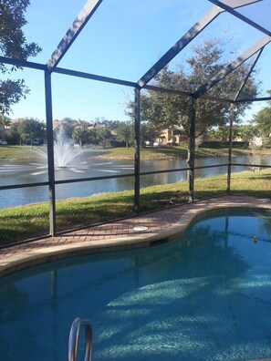 Outdoor pool, a heated pool - Beautiful South Facing Villa on Lake (Estero)