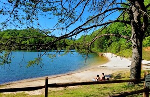 Walk to our private beach. Steps in back yard for 5 min walk to beach and river