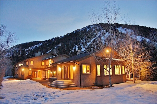 Exterior rear view of the home in March