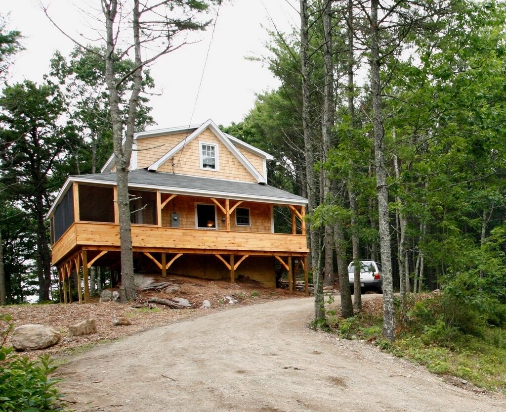 Picturesque Waterfront Cottage with Wraparound Screen Porch